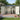 Steel storage shed with open doors, bikes lined up on interior wall