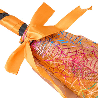 Orange Halloween wand head with black strap, orange bow, and spiderweb fabric