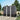 Charcoal black metal garden storage shed with double sliding doors and vertical panels