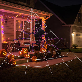 Giant Halloween spider decoration with black body and purple-striped legs on white web