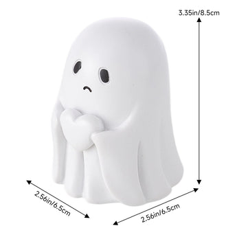 White ghost figurine with cute face and clasped hands, rounded body