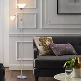 Double-head floor lamp with two fabric shades on a tall white metal pole