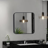 Square bathroom wall mirror with black aluminum frame and rounded corners, light reflections