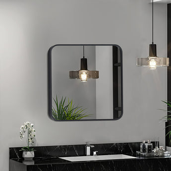 Square bathroom wall mirror with black aluminum frame and rounded corners, light reflections