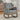 Grey upholstered linen rocking chair with footrest and front storage pocket