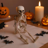 Posable skeleton figure decoration with spread arms and ribcage, Halloween style