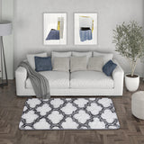 Grey and white geometric indoor shag area rug, trellis pattern on soft pile