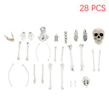Skeleton bones decoration set, 28-piece assortment with skull and bone props, white