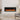 Wall-mounted electric fireplace with black frame and orange flame display