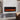 Black electric fireplace insert with tempered glass front and vivid flame glow