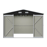 Metal storage shed with open double doors, vented roof panels, and windowless side walls