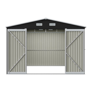 Metal storage shed with open double doors, vented roof panels, and windowless side walls