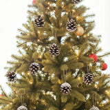 Christmas tree hanging ornaments: pine cones with white accents, plus a few red balls