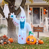 Ghost cat yard decoration in white hooded suit holding jack-o'-lantern pumpkin bucket
