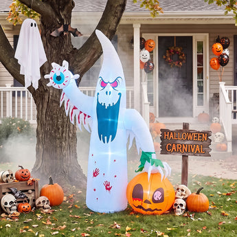 Ghost cat yard decoration in white hooded suit holding jack-o'-lantern pumpkin bucket