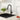 Kitchen sink faucet in black with single lever and curved spout, pull-down style