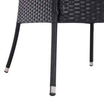 Round outdoor table with parasol hole, black woven legs with white bands.