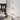 LED spiral standing floor lamp with white light, black round base and glowing tube