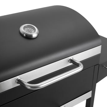 Black grill front with chrome handle, control knob area, and stainless trim