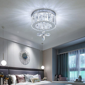 Modern round crystal LED ceiling light with hanging crystal pendant and clear prisms