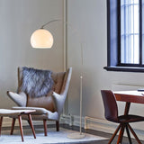 Adjustable LED floor lamp with white dome shade and marble base