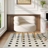 Cream teddy accent chair with curved arms and tufted back, gold tapered legs