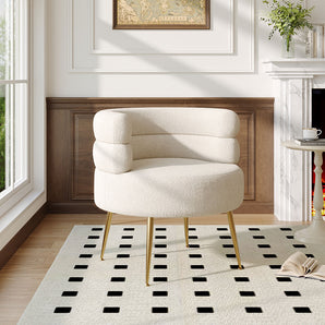 Cream teddy accent chair with curved arms and tufted back, gold tapered legs