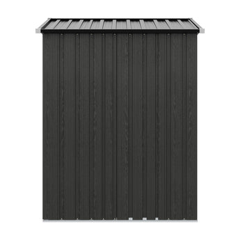 Grey metal garden storage shed back panel with textured siding and sloped roof