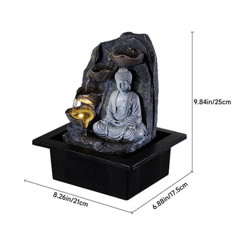 Tabletop Buddha water fountain decor with seated gray Buddha, dark rock, golden spout