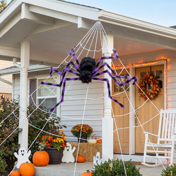 Giant Halloween spider decoration with black body and purple-striped legs with white web