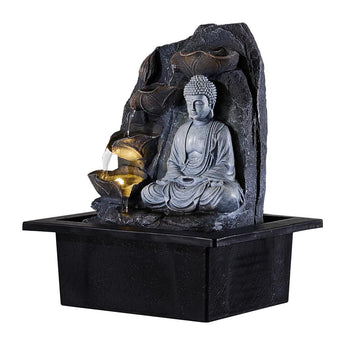 Tabletop Buddha water fountain decor close view of gray Buddha and golden lantern-like cup
