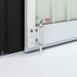 Tool shed door hardware: silver hinge bracket and latch on a white door panel