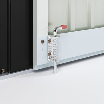 Tool shed door hardware: silver hinge bracket and latch on a white door panel