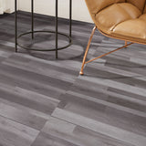 Gray wood-grain vinyl plank flooring with self-adhesive backing, waterproof