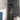 Black shower tower panel with overhead square head, slide rail, and hand shower