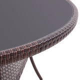 Round outdoor table with parasol hole, dark woven tabletop rim.