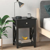 Black wooden nightstand with one drawer and lower shelf, X-frame side panels.