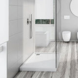 White wetroom shower tray, rectangular shape with drain opening