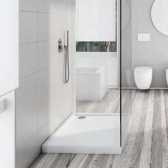 White wetroom shower tray, rectangular shape with drain opening