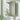Gold-tone framed rectangular bathroom mirror cabinet on wall with rounded corners