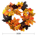 Halloween wreath, 35 cm, with orange and black leaves, bats, pumpkins, and berry clusters