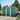 Dark green metal garden storage shed with sliding door and two roof vents