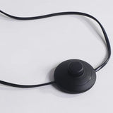 LED spiral lamp power button with black cable near base