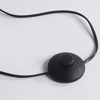 LED spiral lamp power button with black cable near base