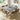 Marble-look self-adhesive vinyl floor tile in gray stone pattern, square cut
