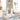 Kids indoor bus playset with slide and white playhouse panels on a rug