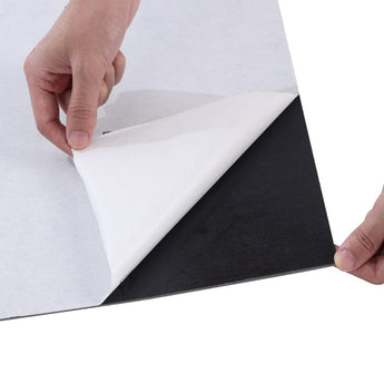 Peel-and-stick square tile: white stone-effect top with black backing backing layer