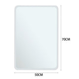 Frameless wall mirror with rounded corners, 50 x 70 cm