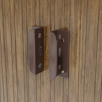 Metal shed door latch and hinges on wood-effect panel