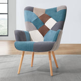 Wingback armchair with footstool, blue/gray diamond patchwork upholstery on wooden legs